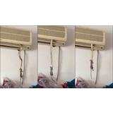 Not cool! Snake hanging from air conditioner devours huge rat